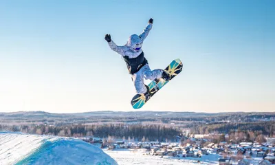 Snowboarding is a popular winter sport that involves riding a snowboard down snow-covered slopes and performing various tricks and maneuvers. Snowboarders can perform a wide range of tricks, including spins, flips, grabs, and slides. 